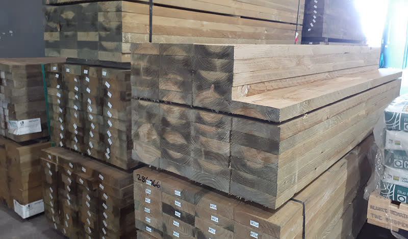 Timber stacked and labelled on pallets